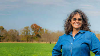 Farmer standing in a field